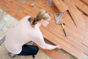 Where should you not use laminate flooring
