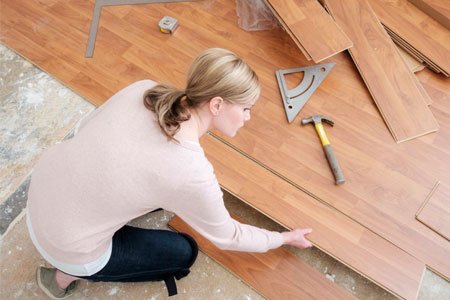 Where should you not use laminate flooring